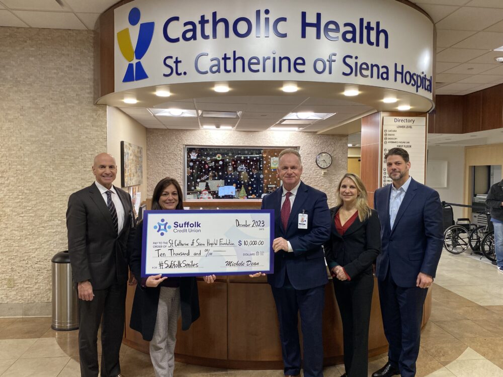 Suffolk Credit Union has given seven local non-profit organizations a boost with their budgets by helping them secure grants from the Federal Home Loan Bank of New York (FHLBNY) Small Business Recovery Grant (SBRG) Program. Pictured (left to right): Randy Howard, Chief Operating Officer, St. Catherine of Siena Hospital; Laura Racioppi, AVP, Corporate & Community Partnerships, Suffolk Credit Union; Declan Doyle, President, St. Catherine of Siena Hospital; Michele Dean, President & CEO, Suffolk Credit Union; Charles Schembri, EVP, Chief Experience Officer, Suffolk Credit Union.